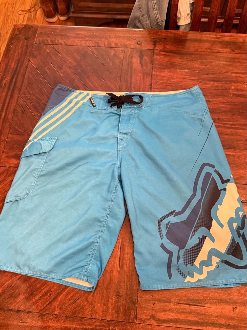 Fox Men’s Light Blue Swim Board Shorts with Navy and Cream Graphic